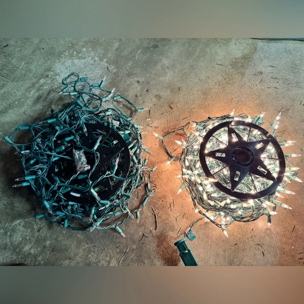 2 long White String Lights strands on storage wheels